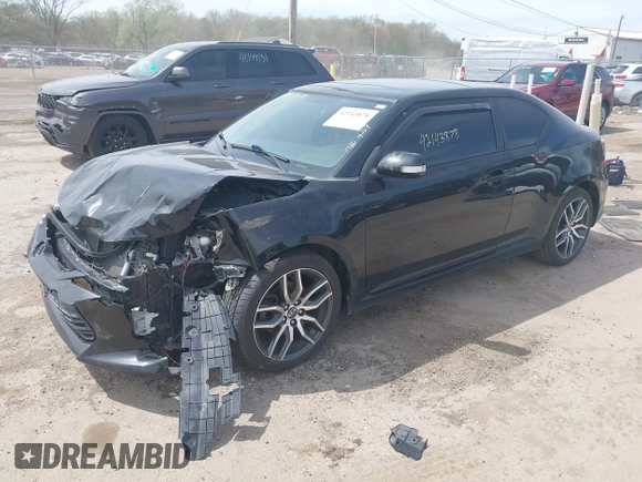 2015 Scion tC z VIN JTKJF5C75FJ012021, wystawiony jako IAAI lot #42143878 z przebiegiem 127 235 mil mil oraz . Historia ofert i sprzedaży dostępna na DreamBid. Obrazek 2.