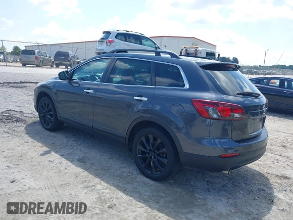 2014 Mazda CX-9 Grand Touring with VIN JM3TB2DA4E0436340, listed as a IAAI auction lot 42442249 with 102,856 mi miles and . Bid and sale history available at DreamBid. Image 3.