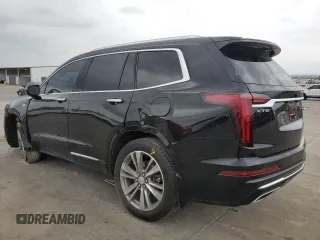 2021 Cadillac XT6 Premium Luxury z VIN 1GYKPERS0MZ181151, wystawiony jako Copart lot #78808104 z przebiegiem 31 697 mil mil oraz Szkoda całkowita • Salvage title. Historia ofert i sprzedaży dostępna na DreamBid. Obrazek 2.