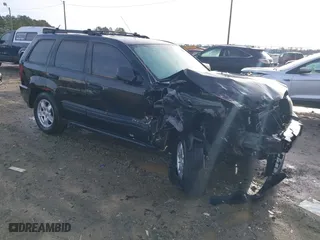 2005 Jeep Grand Cherokee Laredo with VIN 1J4GS48K85C709829, listed as a IAAI auction lot 41200259 with 1 mi miles. Bid and sale history available at carsss.com. Image 1.
