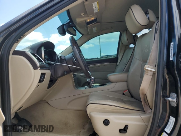 2014 Jeep Grand Cherokee Overland with VIN 1C4RJECG9EC173693, listed as a Copart auction lot 53747045 with 73,234 mi miles and Non Repairable. Bid and sale history available at carsss.com. Image 7.