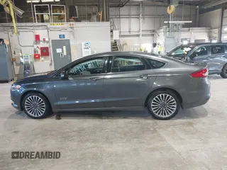 2017 Ford Fusion Titanium with VIN 3FA6P0SU2HR162865, listed as a IAAI auction lot 41981344 with 79,618 mi miles and . Bid and sale history available at DreamBid. Image 14.