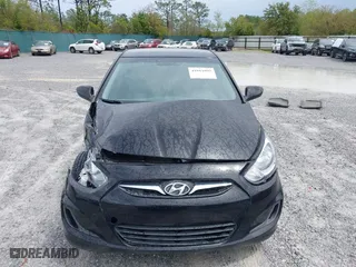 2014 Hyundai Accent GS with VIN KMHCT5AE7EU164658, listed as a IAAI auction lot 41911092 with 132,442 mi miles. Bid and sale history available at carsss.com. Image 12.