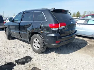 2014 Jeep Grand Cherokee Laredo with VIN 1C4RJEAG0EC442053, listed as a IAAI auction lot 42098601 with 200,982 mi miles and . Bid and sale history available at DreamBid. Image 3.