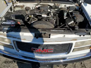 1998 GMC Suburban z VIN 1GKFK16R1WJ700312, wystawiony jako Copart lot #73160574 z przebiegiem 150 174 mil mil oraz Czysty tytuł • Clean title. Historia ofert i sprzedaży dostępna na DreamBid. Obrazek 11.