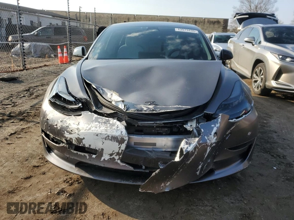 2022 Tesla Model 3 Long Range with VIN 5YJ3E1EBXNF272496, listed as a Copart auction lot 43973435 with 28,450 mi miles and Salvage Title. Bid and sale history available at DreamBid. Image 5.