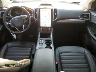 2021 Ford Edge SEL with VIN 2FMPK4J96MBA62421, listed as a Copart auction lot 69049654 with 88,496 mi miles and Salvage Title. Bid and sale history available at carsss.com. Image 8.