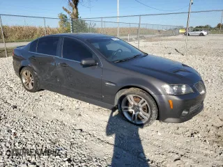 2009 Pontiac G8 with VIN 6G2ER57749L235662, listed as a Copart auction lot 73972344 with 146,384 mi miles and Salvage Title. Bid and sale history available at DreamBid. Image 4.