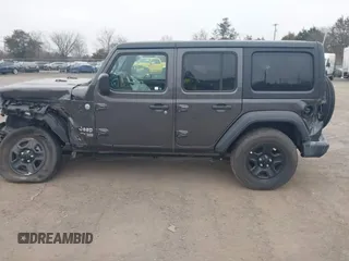 2019 Jeep Wrangler Unlimited Sport Altitude with VIN 1C4HJXDG0KW559807, listed as a IAAI auction lot 41790082 with 34,221 mi miles and . Bid and sale history available at DreamBid. Image 15.