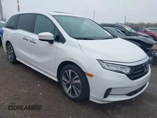 2021 Honda Odyssey Touring z VIN 5FNRL6H80MB008330, wystawiony jako IAAI lot #41966733 z przebiegiem 59 655 mil mil oraz . Historia ofert i sprzedaży dostępna na DreamBid. Obrazek 1.