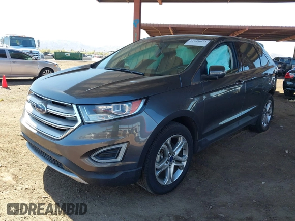 2015 Ford Edge Titanium z VIN 2FMTK3K90FBC12582, wystawiony jako IAAI lot #41860973 z przebiegiem Nie podano mil oraz . Historia ofert i sprzedaży dostępna na DreamBid. Obrazek 16.