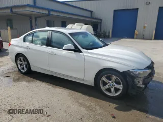 2013 BMW 3 Series 320i xDrive with VIN WBA3C3C57DF980971, listed as a Copart auction lot 57441155 with 131,263 mi miles and Salvage title. Bid and sale history available at DreamBid. Image 4.