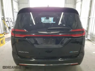 2023 Chrysler Pacifica Hybrid Touring L with VIN 2C4RC1L74PR575358, listed as a Copart auction lot 43261875 with 35,077 mi miles and Clean Title. Bid and sale history available at carsss.com. Image 6.