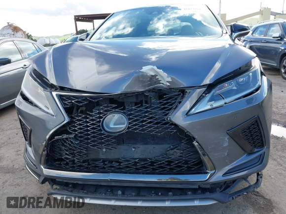2020 Lexus RX with VIN 2T2SZMDA9LC221224, listed as a IAAI auction lot 41823952 with 139,612 mi miles. Bid and sale history available at carsss.com. Image 6.