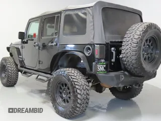 2018 Jeep Wrangler Unlimited Sport S with VIN 1C4HJWDG8JL927497, listed as a Copart auction lot 62701315 with 91,992 mi miles and Salvage title. Bid and sale history available at DreamBid. Image 4.
