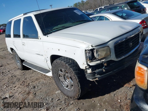 2000 Cadillac Escalade z VIN 1GYEK63R7YR226034, wystawiony jako IAAI lot #41224406 z przebiegiem 293 123 mil mil oraz . Historia ofert i sprzedaży dostępna na DreamBid. Obrazek 1.