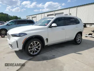 2024 BMW X5 sDrive40i z VIN 5UX13EU05R9S49811, wystawiony jako Copart lot #51493175 z przebiegiem 11 664 mil mil oraz Czysty tytuł • Clean title. Historia ofert i sprzedaży dostępna na DreamBid. Obrazek 1.