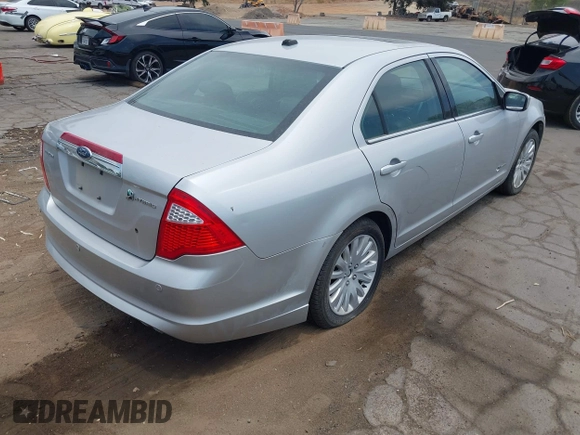 2010 Ford Fusion Hybrid с VIN 3FADP0L38AR296069, выставлен на аукционе IAAI как лот 42760565 с пробегом 94 994 миль миль и . История ставок и продаж доступна на DreamBid. Изображение 4.