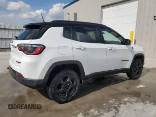 2023 Jeep Compass Trailhawk with VIN 3C4NJDDN5PT567737, listed as a Copart auction lot 61824665 with 43,843 mi miles and Clean title. Bid and sale history available at DreamBid. Image 3.