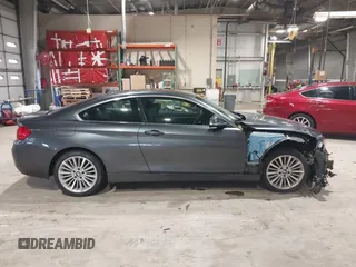 2014 BMW 4 Series 428i xDrive with VIN WBA3N9C56EF721564, listed as a IAAI auction lot 41737409 with 42,052 mi miles and . Bid and sale history available at DreamBid. Image 14.