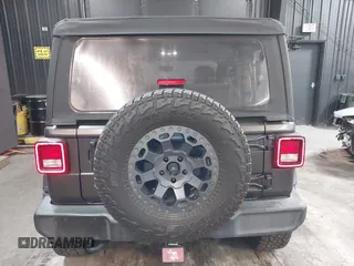 2021 Jeep Wrangler Sport S with VIN 1C4HJXAG2MW502452, listed as a IAAI auction lot 42031159 with 87,952 mi miles and . Bid and sale history available at DreamBid. Image 16.