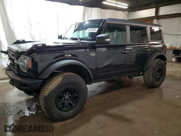 2024 Ford Bronco Wildtrak z VIN 1FMEE2BP1RLA76928, wystawiony jako Copart lot #46423395 z przebiegiem 4873 mil mil oraz Szkody całkowita. Historia ofert i sprzedaży dostępna na DreamBid. Obrazek 1.