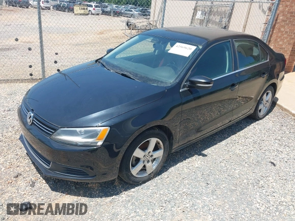 2014 Volkswagen Jetta TDI w/Premium with VIN 3VW3L7AJ6EM420044, listed as a IAAI auction lot 42569620 with 143,482 mi miles and . Bid and sale history available at DreamBid. Image 2.