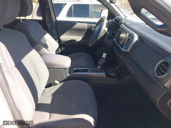 2019 Toyota Tacoma 4WD SR5 with VIN 3TMDZ5BN1KM079305, listed as a IAAI auction lot 41247804 with 98,494 mi miles. Bid and sale history available at carsss.com. Image 5.