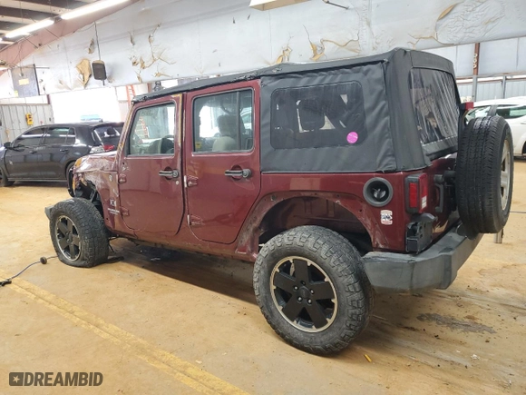 2009 Jeep Wrangler Unlimited X with VIN 1J4GA39149L704314, listed as a Copart auction lot 42699415 with 132,456 mi miles and Salvage Title. Bid and sale history available at carsss.com. Image 2.