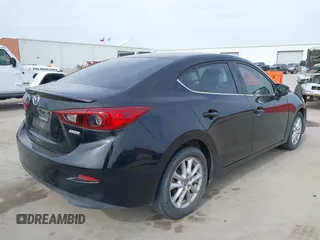 2014 Mazda 3 i Touring with VIN 3MZBM1V71EM100893, listed as a IAAI auction lot 41730726 with 59,596 mi miles and . Bid and sale history available at DreamBid. Image 4.