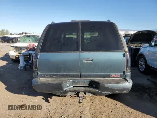 2000 GMC Denali z VIN 1GKEK13R5YR162198, wystawiony jako Copart lot #80325964 z przebiegiem 228 043 mil mil oraz Szkody całkowita. Historia ofert i sprzedaży dostępna na DreamBid. Obrazek 6.