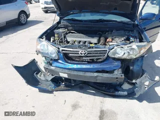 2007 Toyota Corolla CE with VIN 1NXBR32E57Z870768, listed as a IAAI auction lot 41944751 with 202,805 mi miles. Bid and sale history available at carsss.com. Image 6.