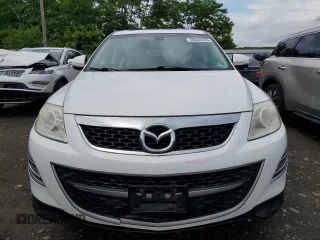2012 Mazda CX-9 Grand Touring with VIN JM3TB3DV9C0338460, listed as a Copart auction lot 59548495 with 219,060 mi miles and Salvage title. Bid and sale history available at DreamBid. Image 5.