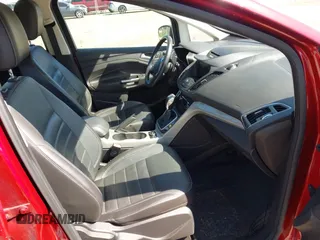 2013 Ford C-Max SEL z VIN 1FADP5BU9DL541245, wystawiony jako IAAI lot #42327686 z przebiegiem 70 507 mil mil oraz . Historia ofert i sprzedaży dostępna na DreamBid. Obrazek 5.