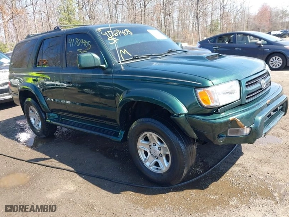 2000 Toyota 4Runner SR5 with VIN JT3HN86R1Y0323093, listed as a IAAI auction lot 41769405 with 156,905 mi miles. Bid and sale history available at carsss.com. Image 1.