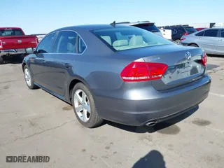 2014 Volkswagen Passat SE w/Sunroof with VIN 1VWBT7A34EC110750, listed as a IAAI auction lot 41754525 with 101,416 mi miles. Bid and sale history available at carsss.com. Image 3.