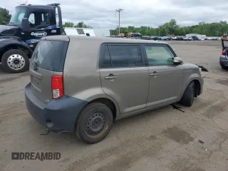 2012 Scion xB z VIN JTLZE4FE1CJ014494, wystawiony jako Copart lot #57779675 z przebiegiem 151 857 mil mil oraz Szkody całkowita. Historia ofert i sprzedaży dostępna na DreamBid. Obrazek 3.