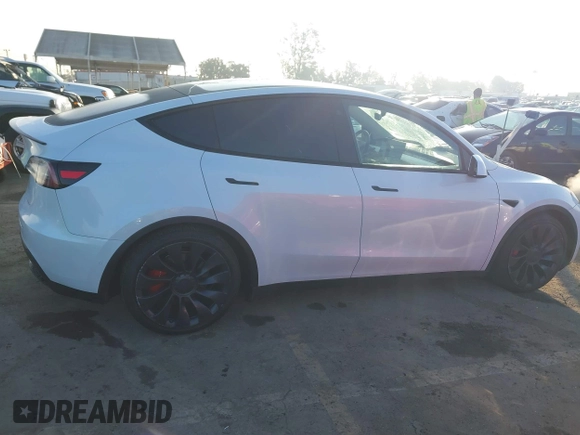2021 Tesla Model Y Performance with VIN 5YJYGDEF2MF258711, listed as a IAAI auction lot 41367832 with 47,662 mi miles and . Bid and sale history available at DreamBid. Image 13.