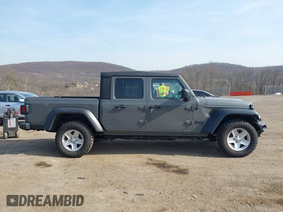 2020 Jeep Gladiator Sport S with VIN 1C6HJTAG2LL157701, listed as a IAAI auction lot 41766647 with 62,571 mi miles. Bid and sale history available at carsss.com. Image 13.
