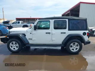 2023 Jeep Wrangler Willys with VIN 1C4HJXDG5PW566145, listed as a IAAI auction lot 41912872 with 50,290 mi miles and . Bid and sale history available at DreamBid. Image 14.