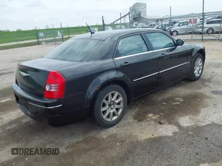 2008 Chrysler 300 Touring with VIN 2C3LA53G08H147012, listed as a IAAI auction lot 42109759 with 169,244 mi miles. Bid and sale history available at carsss.com. Image 4.