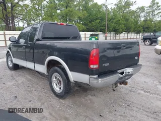 2003 Ford F-150 XL with VIN 1FTRX17L13NA01819, listed as a IAAI auction lot 42719787 with Not provided miles and . Bid and sale history available at DreamBid. Image 3.