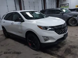 2021 Chevrolet Equinox Premier z VIN 2GNAXXEV4M6128145, wystawiony jako IAAI lot #41893046 z przebiegiem 39 492 mil mil oraz . Historia ofert i sprzedaży dostępna na DreamBid. Obrazek 1.