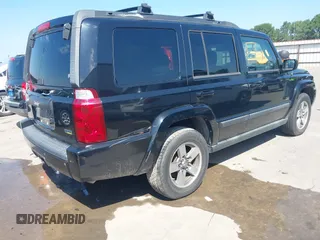 2007 Jeep Commander Sport z VIN 1J8HH48P97C619556, wystawiony jako IAAI lot #42343720 z przebiegiem 152 647 mil mil oraz . Historia ofert i sprzedaży dostępna na DreamBid. Obrazek 4.