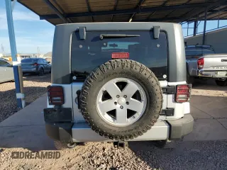 2010 Jeep Wrangler Unlimited Sahara with VIN 1J4HA5H13AL184449, listed as a Copart auction lot 43421945 with 176,725 mi miles and Salvage Title. Bid and sale history available at carsss.com. Image 6.