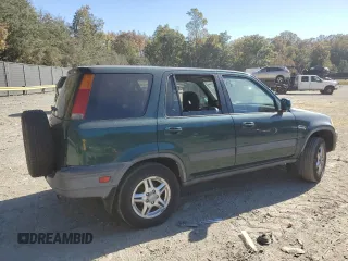 2000 Honda CR-V EX with VIN JHLRD1864YS009698, listed as a Copart auction lot 77073244 with 163,149 mi miles and Clean Title. Bid and sale history available at carsss.com. Image 3.