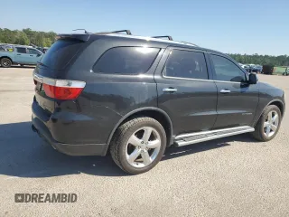 2012 Dodge Durango Citadel z VIN 1C4RDJEG3CC301467, wystawiony jako Copart lot #52531575 z przebiegiem 270 719 mil mil oraz Szkody całkowita. Historia ofert i sprzedaży dostępna na DreamBid. Obrazek 3.