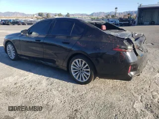 2024 BMW i5 eDrive40 with VIN WBY33FK03RCR92861, listed as a Copart auction lot 88443755 with 13,138 mi miles and Salvage title. Bid and sale history available at DreamBid. Image 2.