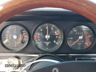 1971 Porsche 911 with VIN 9111120590, listed as a Copart auction lot 52559665 with 44,582 mi miles and Salvage title. Bid and sale history available at DreamBid. Image 9.