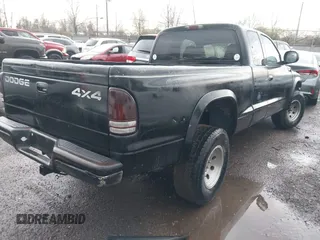 2002 Dodge Dakota z VIN 1B7GG32X22S634407, wystawiony jako IAAI lot #41891953 z przebiegiem 222 595 mil mil oraz . Historia ofert i sprzedaży dostępna na DreamBid. Obrazek 4.